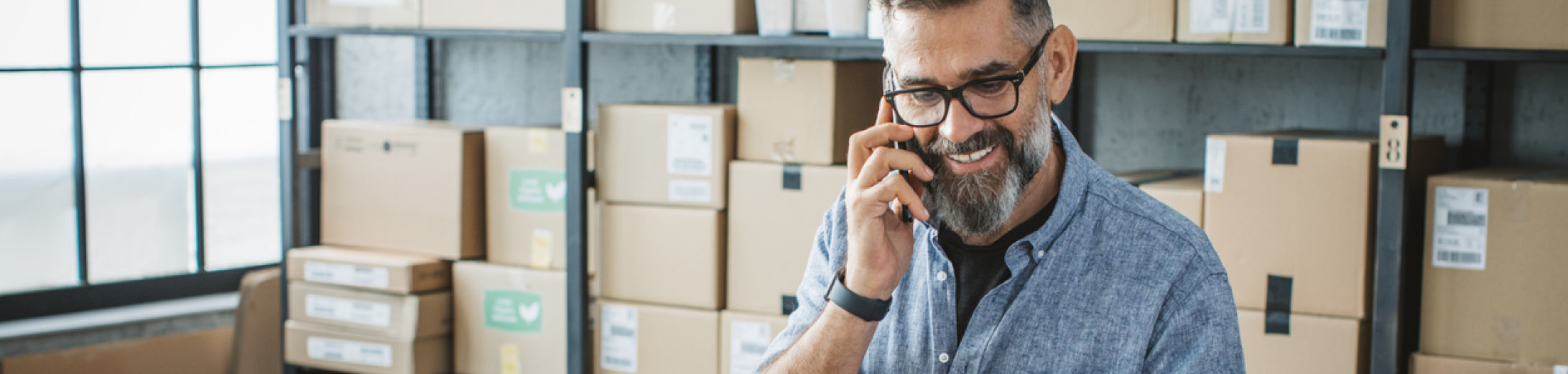 male business owner talking on the phone