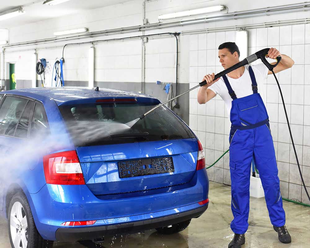 A person washing a car